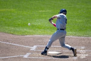 Xavier Musketeer infielder Clay Burdette (5) doubles scoring two runs against the Creighton Bluejays in the seventh inning during a college baseball game on Sunday, May 11, 2025 in Omaha, Nebraska. Photo by John S. Peterson.