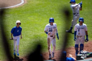 Creighton Bluejays fans celebrates outfielder Tate Gillen (20) scoring a run in the seventh inning against the Xavier Musketeers during a college baseball game on Sunday, May 11, 2025 in Omaha, Nebraska. Photo by John S. Peterson.