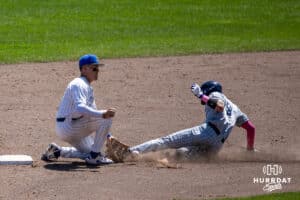 Creighton Bluejay infielder Ben North (11) gets Xavier Musketeer Aedan Anderson (9) out trying to steall during a college baseball game on Sunday, May 11, 2025 in Omaha, Nebraska. Photo by John S. Peterson.