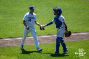 Creighton Bluejay catcher Connor Capece (2) gives pitcher Shea Wendt (14) five against the Xavier Musketeers during a college baseball game on Sunday, May 11, 2025 in Omaha, Nebraska. Photo by John S. Peterson.