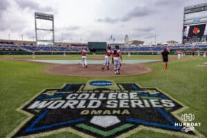 Louisville Cardinals warming up to take on the Coastal Carolina Chanticleers during the College World Series on Wednesday, June 18, 2025 in Omaha, Nebraska. Photo by John S. Peterson.