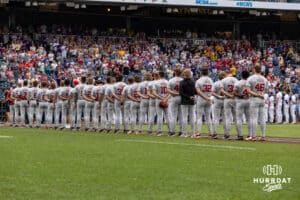 Arkansas Razorbacks lineed up for the National Anthem before taking on the LSU Tigers during the College World Series on Wednesday, June 18, 2025 in Omaha, Nebraska. Photo by John S. Peterson.