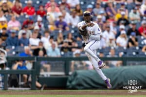 LSU Tiger third baseman Michael Braswell (10) throws to first base against the Arkansas Razorbacks in the first inning during the College World Series on Wednesday, June 18, 2025 in Omaha, Nebraska. Photo by John S. Peterson.