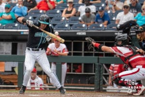 Coastal Carolina Chanticleer infielder Blake Barthol (7) gets hit by a pitch during a baseball game Thursday June 18th 2025 in Omaha Nebraska. Photo by Brandon Tiedemann.