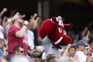 Arkansas Razorbacks Calling the Hogs celebrating a play against the LSU Tigers in the first inning during the College World Series on Wednesday, June 18, 2025 in Omaha, Nebraska. Photo by John S. Peterson.