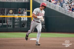 Arkansas Razorback catcher Ryder Helfrick (27) rounds the bases during a baseball game Thursday June 18th 2025 in Omaha Nebraska. Photo by Brandon Tiedemann.