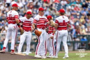 Louisville Cardinal pitcher Jake Schweitzer (8) comes in to pitch against the Coastal Carolina Chanticleers in the first inning during the College World Series on Wednesday, June 18, 2025 in Omaha, Nebraska. Photo by John S. Peterson.