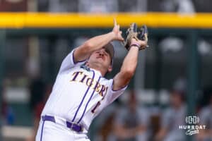 LSU Tiger outfielder Josh Pearson (11) a catch for an out against the Arkansas Razorbacks during the College World Series on Wednesday, June 18, 2025 in Omaha, Nebraska. Photo by John S. Peterson.