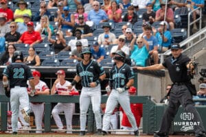 Coastal Carolina Chanticleers celebrate during a baseball game Thursday June 18th 2025 in Omaha Nebraska. Photo by Brandon Tiedemann.