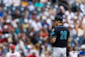 Coastal Carolina Chanticleer pitcher Riley Eikhoff (26) prepares to throw a pitch in the second inning against the Louisville Cardinals during the College World Series on Wednesday, June 18, 2025 in Omaha, Nebraska. Photo by John S. Peterson.