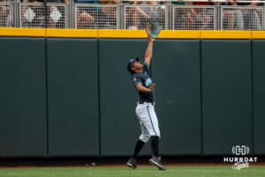 Coastal Carolina Chanticleer outfielder Sebastian Alexander (1) catches a ball during a baseball game Thursday June 18th 2025 in Omaha Nebraska. Photo by Brandon Tiedemann.