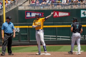 LSU Tiger outfielder Ethan Frey (16) celebrates a double during a baseball game Sunday June 22nd 2025 in Omaha Nebraska. Photo by Brandon Tiedemann.