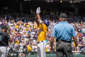LSU Tiger outfielder Chris Stanfield (1) celebrates a hit during a baseball game Sunday June 22nd 2025 in Omaha Nebraska. Photo by Brandon Tiedemann.