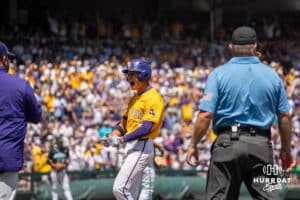 LSU Tiger outfielder Derek Curiel (6) cheers during a baseball game Sunday June 22nd 2025 in Omaha Nebraska. Photo by Brandon Tiedemann.