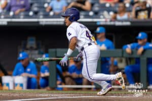 LSU Tiger infielder Steven Milam (4) singles in the fourth inning against the UCLA Bruins during the College World Series on Tuesday, June 17, 2025 in Omaha, Nebraska. Photo by John S. Peterson.