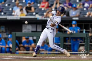 LSU Tiger utility Jake Brown (7) hits a one run single against the UCLA Bruins in the fourth inning during the College World Series on Tuesday, June 17, 2025 in Omaha, Nebraska. Photo by John S. Peterson.