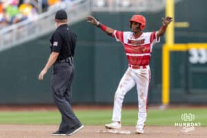 Louisville Cardinal infielder Kamau Neighbors (5) advanced to second on a throwing error against the Coastal Carolina Chanticleers in the fifth inning during the College World Series on Wednesday, June 18, 2025 in Omaha, Nebraska. Photo by John S. Peterson.