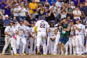 LSU Tiger first baseman Jared Jones (22) celebrates his home run in the eighth inning against the Arkansas Razorbacks during the College World Series on Wednesday, June 18, 2025 in Omaha, Nebraska. Photo by John S. Peterson.
