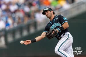 Coastal Carolina Chanticleer infielder Blake Barthol (7) throws to first against the Louisville Cardinals in the fifth inning during the College World Series on Wednesday, June 18, 2025 in Omaha, Nebraska. Photo by John S. Peterson.