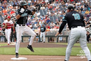 Coastal Carolina Chanticleer infielder Dean Mihos (8) celebrates during a baseball game Thursday June 18th 2025 in Omaha Nebraska. Photo by Brandon Tiedemann.
