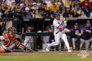 LSU Tiger infielder Steven Milam (4) singles in the ninth inning against the Arkansas Razorbacks during the College World Series on Wednesday, June 18, 2025 in Omaha, Nebraska. Photo by John S. Peterson.