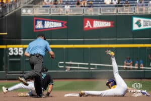 LSU Tiger outfielder Ethan Frey (16) gets tagged out during a baseball game Sunday June 22nd 2025 in Omaha Nebraska. Photo by Brandon Tiedemann.