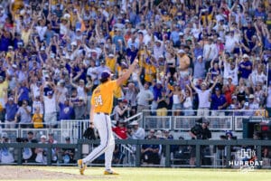LSU Tiger pitcher Chase Shores (34) celebrates the win over the Coastal Carolina Chanticleers in the second game of the finals during the College World Series on Sunday, June 22, 2025 in Omaha, Nebraska. Photo by John S. Peterson.
