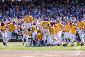 LSU Tigers celebrate the win over the Coastal Carolina Chanticleers in the second game of the finals during the College World Series on Sunday, June 22, 2025 in Omaha, Nebraska. Photo by John S. Peterson.