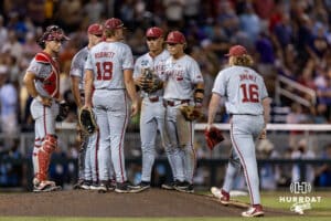 Arkansas Razorback pitcher Aiden Jimenez (16) comes in to relieve Gibler in the ninth inning against the LSU Tigers during the College World Series on Wednesday, June 18, 2025 in Omaha, Nebraska. Photo by John S. Peterson.