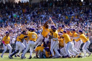 LSU Tigers celebrate the win over the Coastal Carolina Chanticleers in the second game of the finals during the College World Series on Sunday, June 22, 2025 in Omaha, Nebraska. Photo by John S. Peterson.