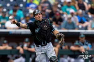 Coastal Carolina Chanticleer catcher Caden Bodine (17) throws to first for the out against the Louisville Cardinals in the seventh inning during the College World Series on Wednesday, June 18, 2025 in Omaha, Nebraska. Photo by John S. Peterson.