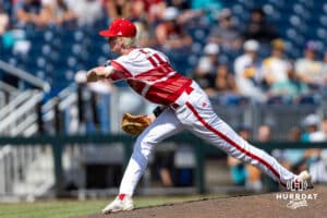 Louisville Cardinal pitcher Ty Starke (11) throws a pitch against the Coastal Carolina Chanticleers in the eighth inning during the College World Series on Wednesday, June 18, 2025 in Omaha, Nebraska. Photo by John S. Peterson.