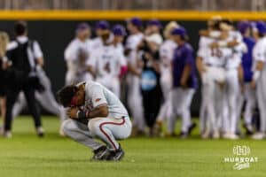 Arkansas Razorback outfielder Justin Thomas Jr. (4) reacts to the loss to the LSU Tigers during the College World Series on Wednesday, June 18, 2025 in Omaha, Nebraska. Photo by John S. Peterson.