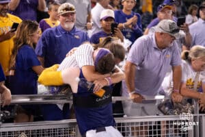 LSU Tiger first baseman Jared Jones (22) hugs his mom Michella after a baseball game Thursday June 18th 2025 in Omaha Nebraska. Photo by Brandon Tiedemann.