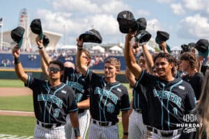 Coastal Carolina Chanticleers tips the cap to fans during a baseball game Thursday June 18th 2025 in Omaha Nebraska. Photo by Brandon Tiedemann.