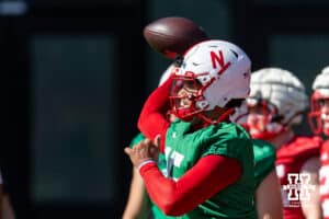 Nebraska Cornhusker Dylan Raiola (15) running passing drills during practice on Monday, July 28, 2025 in Lincoln, Nebraska. Photo by John S. Peterson.