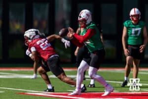Nebraska Cornhusker Dylan Raiola (15) running passing drills during practice on Monday, July 28, 2025 in Lincoln, Nebraska. Photo by John S. Peterson.