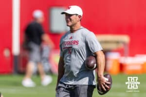 Nebraska Cornhusker special teams coordinator Mike Ekeler walking across the field during practice on Monday, July 28, 2025 in Lincoln, Nebraska. Photo by John S. Peterson.