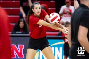 Nebraska Cornhusker Virginia Adriano (9) warms up to take on the Nebraska alumni team during the Nebraska alumni match on Saturday, Aug. 16, 2025 in Lincoln, Nebraska. Photo by John S. Peterson.