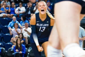 Saige Damrow screams in celebration during the Creighton Volleyball Exhibition game vs Colorado State on August 16th, 2025 in Omaha, Nebraska. Photo by Drew Balus