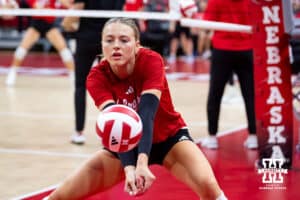 Nebraska Cornhusker Allie Sczech (3) digs the ball warming up to take on the Nebraska alumni team during the Nebraska alumni match on Saturday, Aug. 16, 2025 in Lincoln, Nebraska. Photo by John S. Peterson.