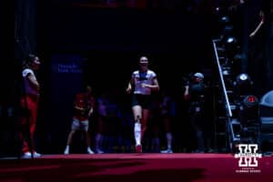 Nebraska Cornhusker Bergen Reilly (2) runs out to the court when introduced for taking on the Stanford Cardinals during the AVAC First Serve volleyball match on Sunday, Aug. 24, 2025 in Lincoln, Nebraska. Photo by John S. Peterson.