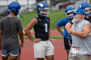 Max Clark talks with a coach during Omaha North football practice on August 11th, 2025 in Omaha Nebraska. Photo by Brandon Tiedemann.