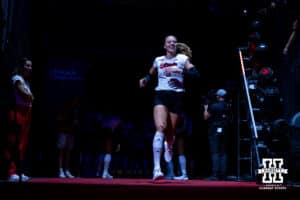 Nebraska Cornhusker Allie Sczech (3) runs out to the court be taking on the Stanford Cardinals during the AVAC First Serve volleyball match on Sunday, Aug. 24, 2025 in Lincoln, Nebraska. Photo by John S. Peterson.