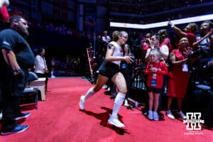 Nebraska Cornhusker Rebekah Allick (5) runs out to the court when introduced before taking on the Pittsburgh Panthers during the AVAC Showcase volleyball match on Friday, Aug. 22, 2025, in Lincoln, Nebraska. Photo by John S. Peterson.