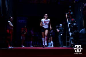 Nebraska Cornhusker Rebekah Allick (5) runs out to the court when introduced before taking on the Stanford Cardinals during the AVAC First Serve volleyball match on Sunday, Aug. 24, 2025 in Lincoln, Nebraska. Photo by John S. Peterson.