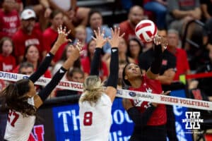 Nebraska Cornhuskers Ryan Hunter (18) spikes the ball against Harper Murray (27) and Kenna Cogill (8) in the first set during the Red/White Scrimmage on Saturday, Aug. 9, 2025 in Lincoln, Nebraska. Photo by John S. Peterson.