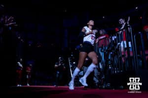 Nebraska Cornhusker Harper Murray (27) runs out to the court before taking on the Stanford Cardinals during the AVAC First Serve volleyball match on Sunday, Aug. 24, 2025 in Lincoln, Nebraska. Photo by John S. Peterson.