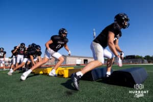 Lincoln Southeast players shuffle through bags during a football practice on Saturday, August 23, 2025, Lincoln, Nebraska. Photo by Braden Cochran.