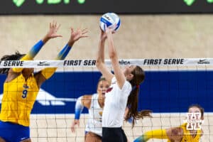 Nebraska Cornhusker Bergen Reilly (2) sets the ball against the Pittsburgh Panthers in the first set during the AVAC Showcase volleyball match on Friday, Aug. 22, 2025, in Lincoln, Nebraska. Photo by John S. Peterson.